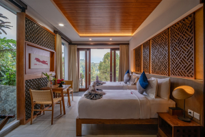 Munduk Harvest Palace - Villa 2 - Deluxe Twin Room - Bedroom 1.jpg